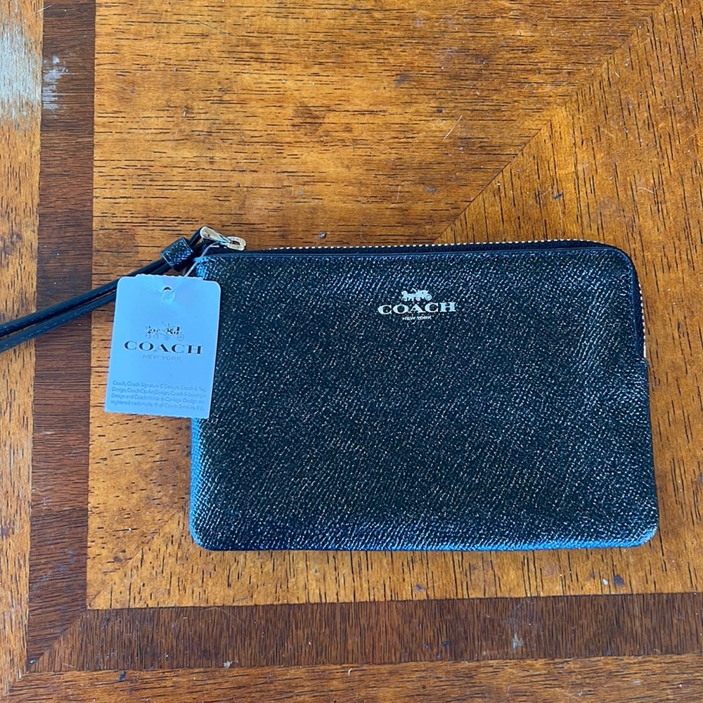 Brand new coach wristlet in black sparkle